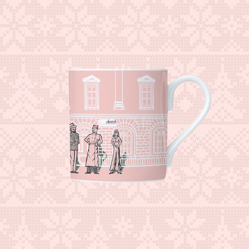 Load image into Gallery viewer, sketch Mug with architectural design on a pink patterned background