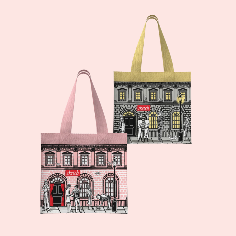 Load image into Gallery viewer, Two tote bags with illustrated building designs on a pink background