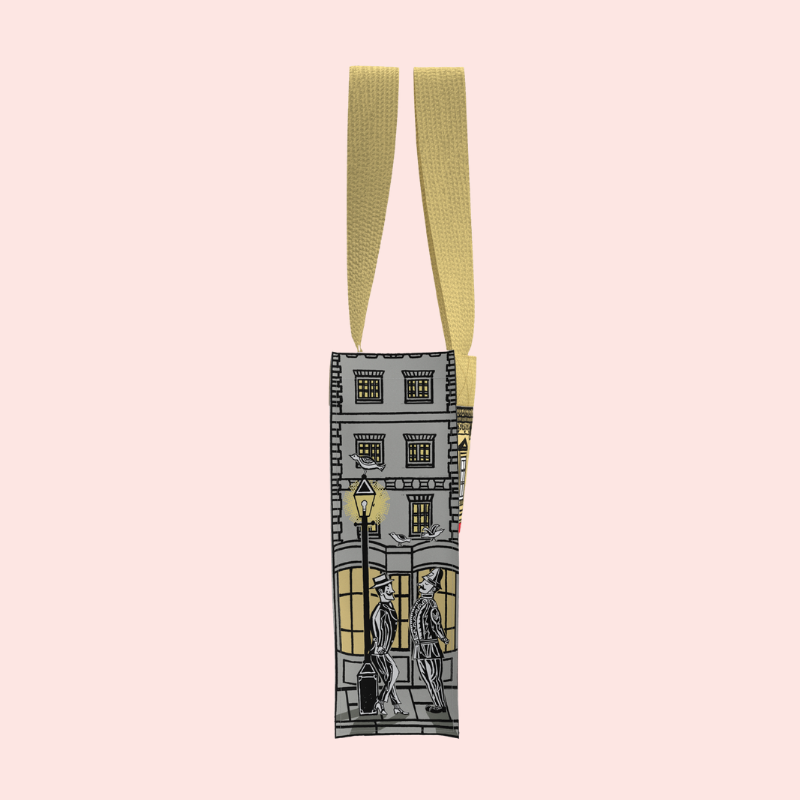 Load image into Gallery viewer, Bag with a design of a building and two people on a pink background