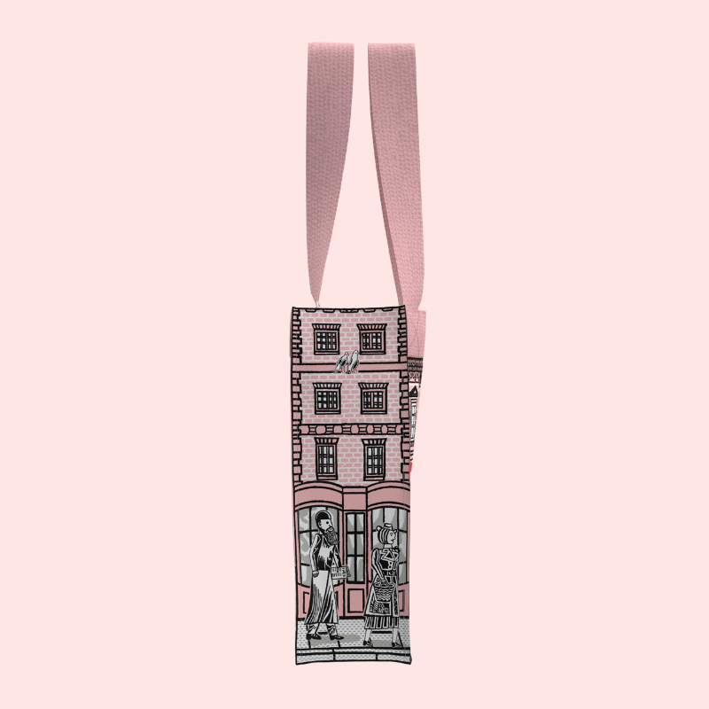 Load image into Gallery viewer, tote bag with a design of a building and two people on a pink background