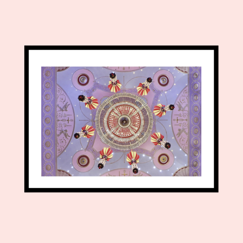Load image into Gallery viewer, Decorative wall art with a circular design and colorful elements on a pink background