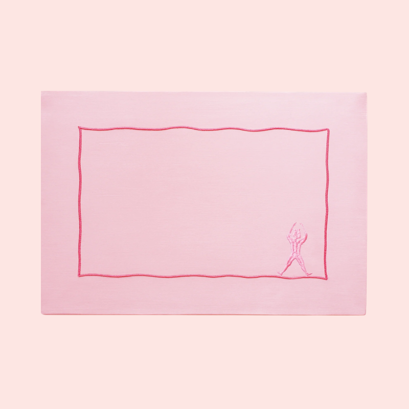 Load image into Gallery viewer, Pink pillowcase with red border and embroidered design on a pink background